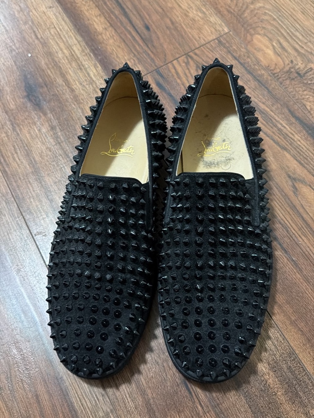 Christian Louboutin Men's Black Spiked Slip-Ons with Red Soles